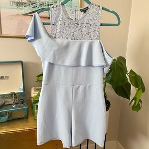 Baby blue Express shorts romper with lace detail neck line. New. Size 8.